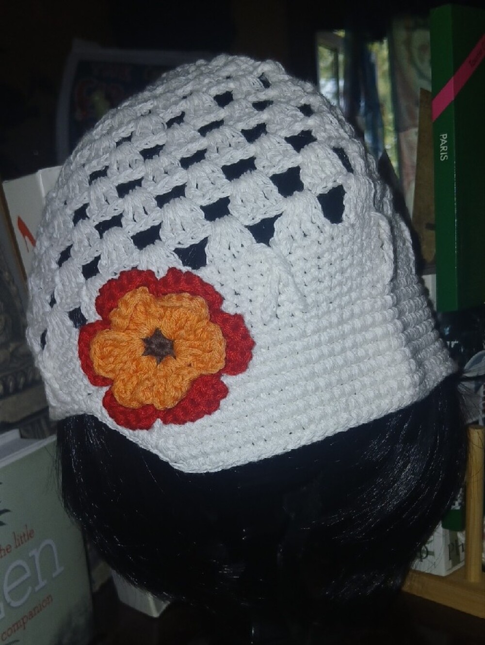 White Crochet Beanie with Red & Orange Flower Accent